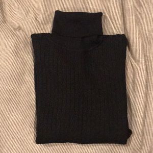 Black Turtleneck by French Designer